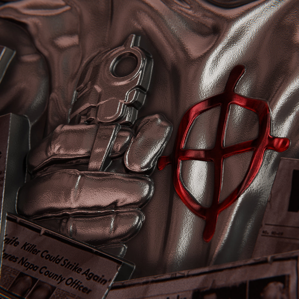 close up image of the zodiac killer silver coin
