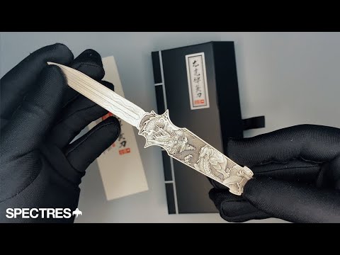 packaging unboxing video of the dragon tiger switchblade silver coin