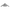 Silver B-2 Spirit stealth bomber coin showing cockpit and wing panel lines