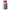 Collectible medicine bottle with red ribbed cap and silver-toned body