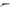 Engraved silver revolver coin, side view with ornate receiver and barrel
