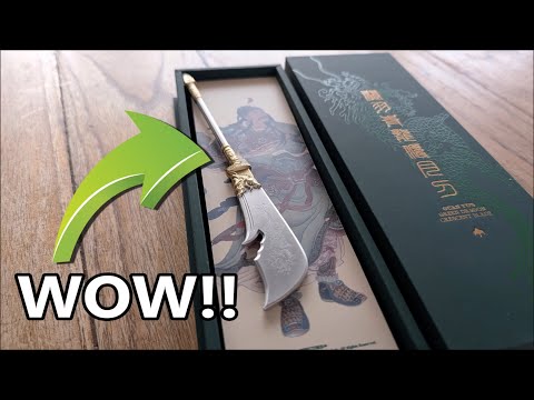 video product review of the guan yu green dragon crescent blade 2 oz pure silver coin